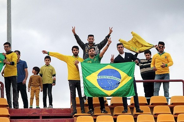 عکس/پرچم برزیل در مشهد بالا رفت